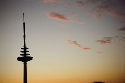 Low angle view of street light against sky during sunset