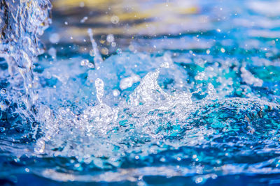 Close-up of water splashing in swimming pool