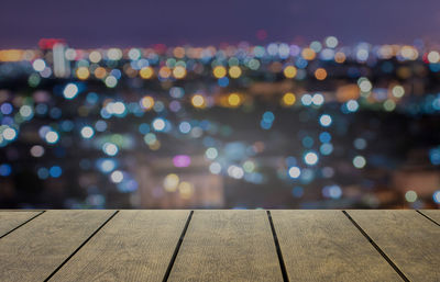 Defocused image of illuminated lights at night