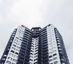 Low angle view of modern building against sky