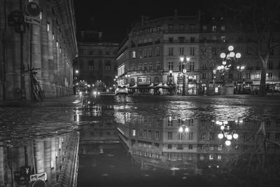 Illuminated buildings in city at night