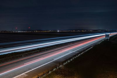 Light trails on road at night