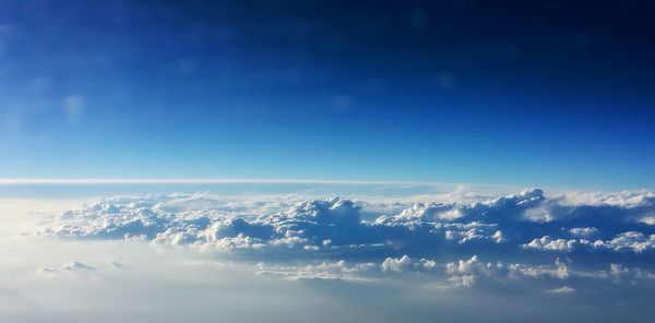 Aerial view of clouds over blue sky