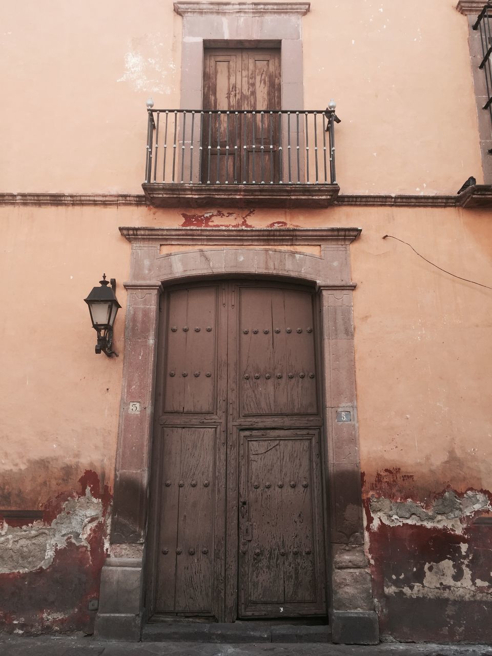 architecture, built structure, building exterior, door, old, weathered, house, closed, abandoned, wall - building feature, window, damaged, run-down, residential structure, deterioration, obsolete, entrance, building, residential building, wall