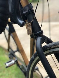 Close-up of bicycle on field