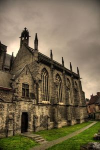 Low angle view of old building against sky