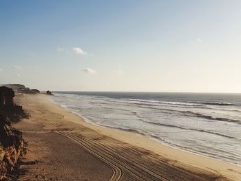 Scenic view of beach against sky