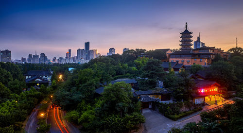 View of city lit up at night