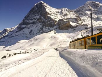 Snow covered mountain against sky