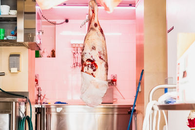 High angle view of people standing on table