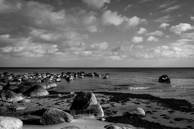 Scenic view of beach against sky