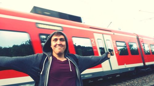 Portrait of young woman in train