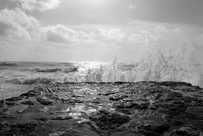 Sea wave splashing on groyne