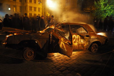 Burning car at demonstration at street 