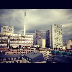 Low angle view of modern buildings against sky