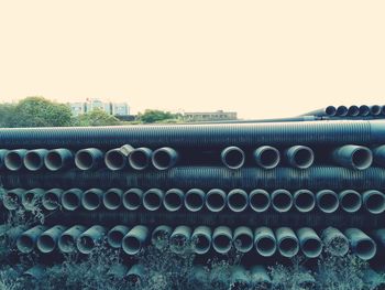 Close-up of pipes against clear sky