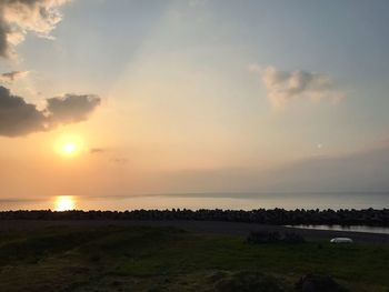 Scenic view of sea against sky during sunset