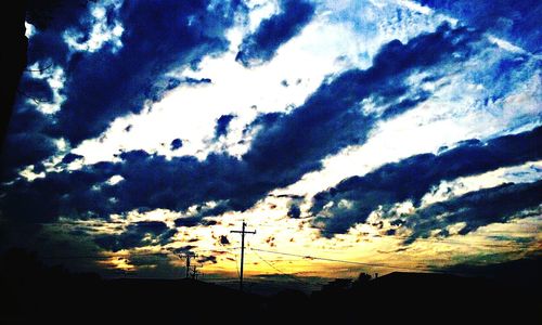 Scenic view of landscape against cloudy sky