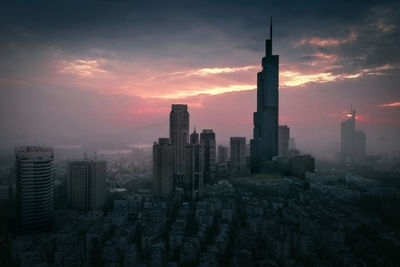 Cityscape against sky during sunset