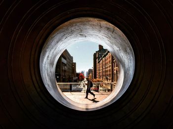 People walking in tunnel