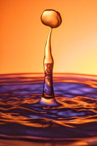 Close-up of water splashing in sea