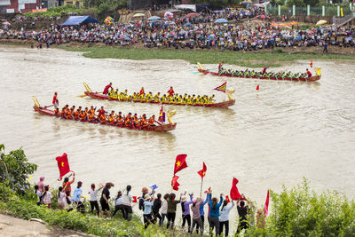 High angle view of people enjoying in river