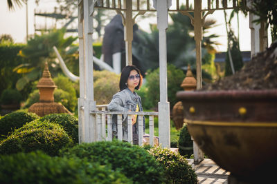 Beautiful woman sitting at park