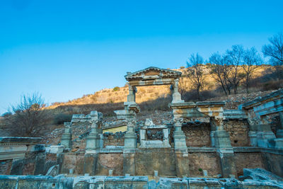 Old ruin building against blue sky