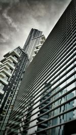 Low angle view of modern buildings against sky