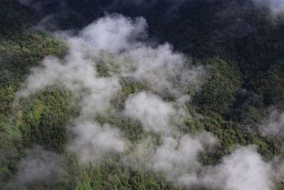 Hills through the layers of cloud