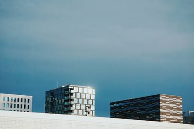 Low angle view of modern buildings against sky