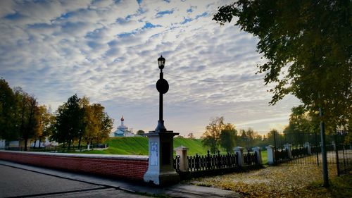 View of empty benches against the sky