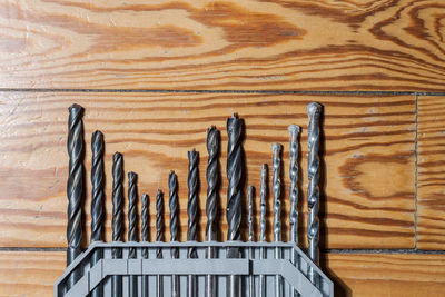 High angle view of wooden posts on table