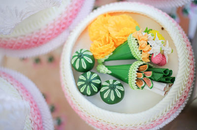 High angle view of various flowers in container