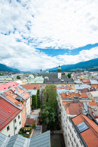 High angle view of buildings in city against sky