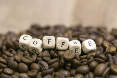 Close-up of coffee beans on table