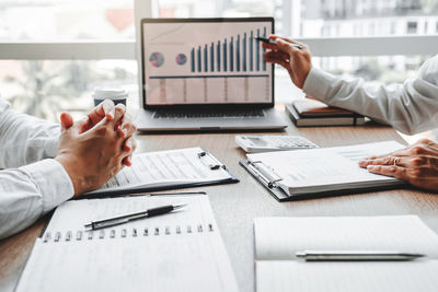 Business colleagues working on table