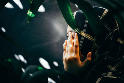 Close-up of man playing guitar