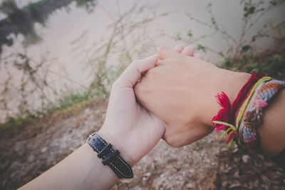 Close-up of woman holding hands