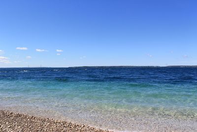 Scenic view of calm sea against sky