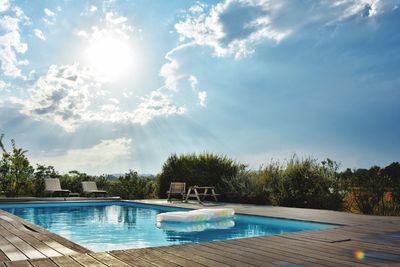 Swimming pool against sky