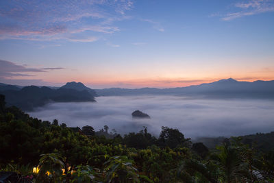 Scenic view of mountains against sky during sunset