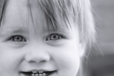 Close-up portrait of smiling girl