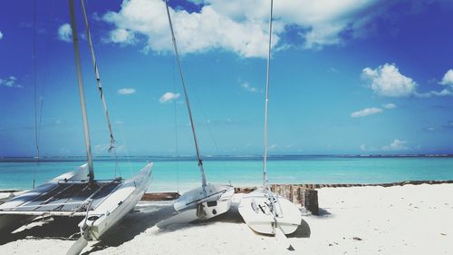 Panoramic view of beach against blue sky