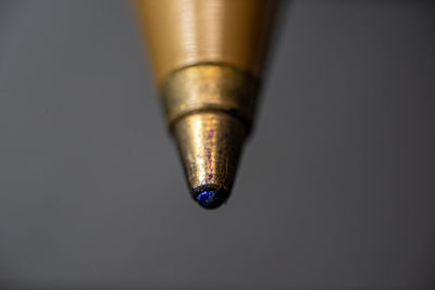 Close-up of old glass against white background