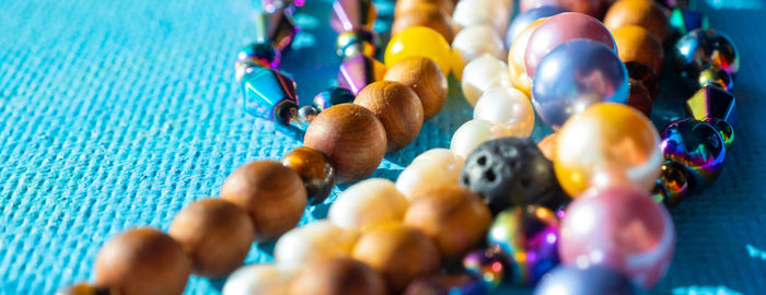 High angle view of multi colored swimming in pool