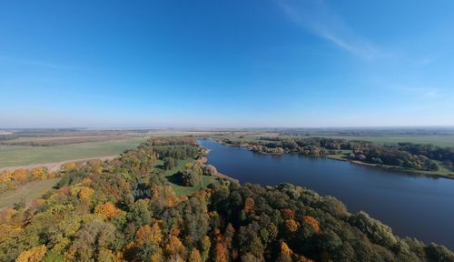 High angle view of river against blue sky