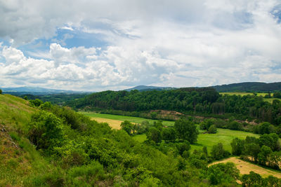 View of the chain of auvergne volcanoes under a thunderstorm