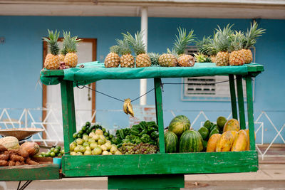 Fresh foot and vegetables for sale in local market. pineapples, melons.