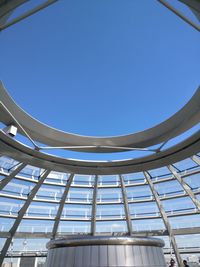 Low angle view of modern building against clear blue sky